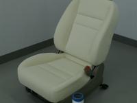 Car seat with the new bio-fabric and spool of yarn