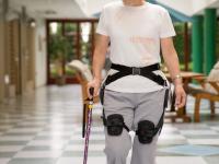 Rehabilitation training with Honda's walking assit device and a cane (image)