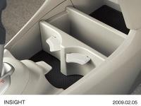 Front Console Compartment (with separated pockets / beverage holders)