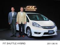 pictured right to left are Takanobu Ito President and CEO, Representative Director of Honda, Kohei Hitomi LPL of FIT SHUTTLE / FIT SHUTTLE HYBRID
