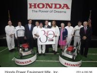 (center) North Carolina Gov. Pat McCrory (two persons with the board) HPE Associates (the 4th person from left) Takuji Yamada, Honda COO of North American Regional Operation
