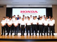 Managing Officer and Director, Masahiro Yoshida, with all riders, drivers and team directors