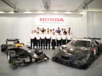 Managing Officer and Director, Masahiro Yoshida, with all drivers and team directors