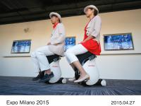 Japan Pavilion attendants riding UNI-CUB ß
