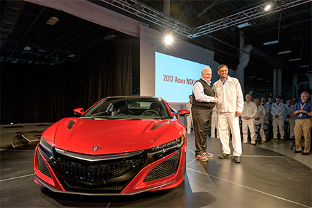 From left, Rick Hendrick, owner of Hendrick Motorsports, takes delivery of 2017 Acura NSX, VIN 001, from Acura NSX Engineering Large Project Leader Clement D'Souza.