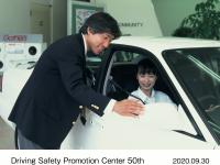 Safety Coordinator offering advice to customers at a dealership location when the system was first introduced