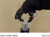 Honda Avatar Robot Open a can using pull tab