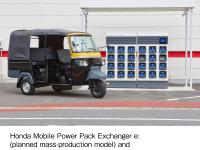 Honda Mobile Power Pack Exchanger e:(planned mass-production model) and an electric rickshaw