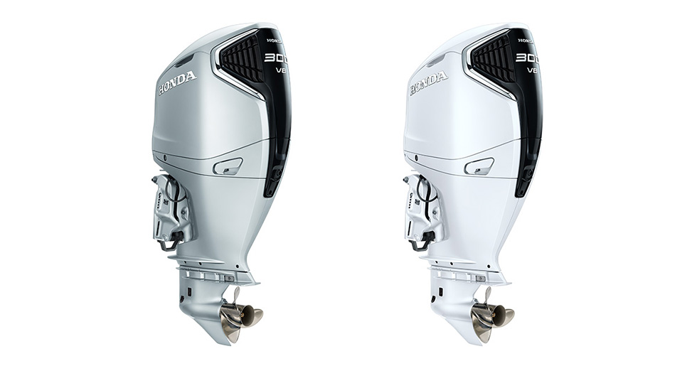 New BF300 outboard motor encased in Aquamarine Silver (left) or Grand Prix White (right)