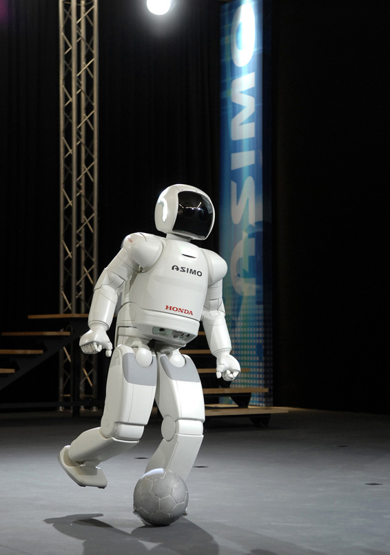 The new ASIMO kicks a ball