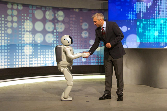 ASIMO meets Serbian TV presenter Zoran Stanojevic