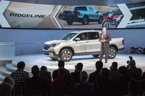 John Mendel, executive vice president, Automobile Division, of American Honda Motor Co., Inc., introduces the all-new 2017 Honda Ridgeline on January 11 at the 2016 North American International Auto Show in Detroit.