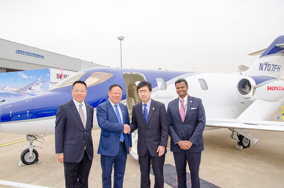 Chairman of Honsan General Aviation Co., Ltd. Mr. Zhou Yuxi, Honda Aircraft Company President & CEO Michimasa Fujino