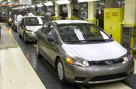 Honda Civics on production line in Alliston, Ontario, Canada. Honda will enhance its ability to match flexible manufacturing capacity with market demand in a move that will make it possible to increase North American production of fuel efficient 4-cylinder Civic models in early 2007 by up to 60,000 units on an annual basis.