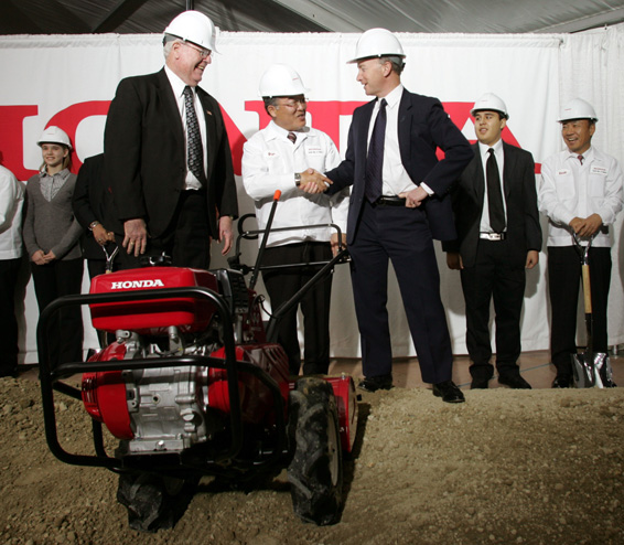 Indiana Governor Mitch Daniels (Right) with Honda Manufacturing of Indiana President & CEO Yuzo Uenohara (Center) and Greensburg, Indiana Mayor Frank Manus (Left) at the official groundbreaking ceremony for Hondafs new $550 million automobile plant in Greensburg, Ind. The plant, which will create 2,000 jobs, will produce the fuel-efficient Honda Civic sedan.