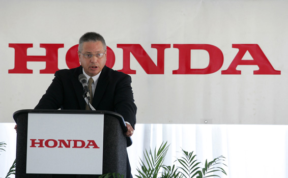 American Honda Motor Co. Inc. Senior Manager Tony Gomes speaks at the opening today of the $89 million Midwestern Consolidation Center, a master hub where parts from Honda's U.S. plants and 525 U.S. supplier plants will be packaged and shipped to smaller Honda warehouses and then on to 1,200 Honda and Acura dealers. (Photo by Paul Vernon.)