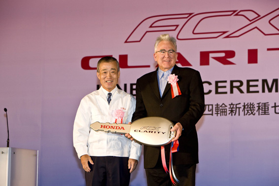 Film producer Ron Yerxa (right) receives a key from Honda Motor Co., Ltd. president and CEO Takeo Fuki during a ceremony on June 16, 2008, for the start of FCX Clarity production. The ceremony took place at the world's first dedicated fuel cell vehicle manufacturing facility, located in Tochigi, Japan. Yerxa will take delivery of the first FCX Clarity in July 2008.