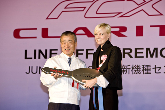 Actress Laura Harris receives a key from Honda Motor Co., Ltd. president and CEO Takeo Fuki during a ceremony on June 16, 2008, for the start of FCX Clarity production. The ceremony took place at the world's first dedicated fuel cell vehicle manufacturing facility, located in Tochigi, Japan.