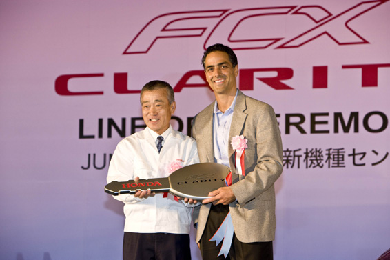 Jon Spallino (right) , already the world's first retail fuel cell vehicle customer who has been leasing the current generation FCX since 2005, receives a key from Honda Motor Co., Ltd. president and CEO Takeo Fuki during a ceremony on June 16, 2008, for the start of FCX Clarity production. The ceremony took place at the world's first dedicated fuel cell vehicle manufacturing facility, located in Tochigi, Japan.