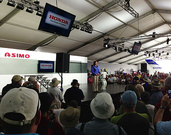 ASIMO performs for the crowd at the 2013 EAA AirVenture.