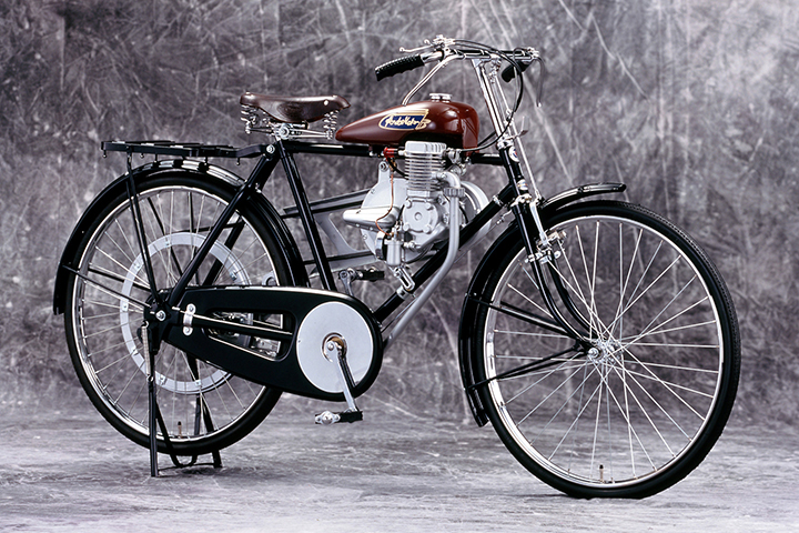 Honda’s first original product, the Honda A-Type auxiliary engine for bicycles. The engine’s distinctive sound earned it the nickname “Batabata”