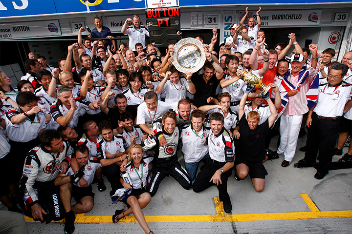 The Honda Racing F1 Team celebrating Button's first F1 victory