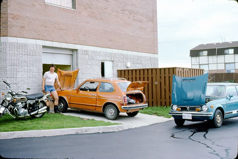 Earning his tuition by repairing Honda Civics