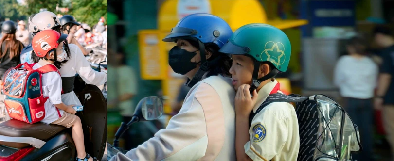 A rider riding with a child on the back seat