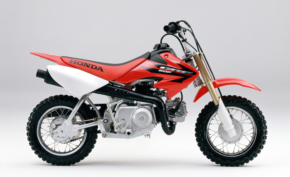 オフロード走行専用車「CRF50F/CRF70F/CRF100F」の タンクシュラウドのグラフィックデザインを変更した2006年モデルを発売 |  Honda 企業情報サイト