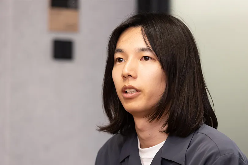 開発したシステムの効果検証や社内環境への適応整備等を担当した小池