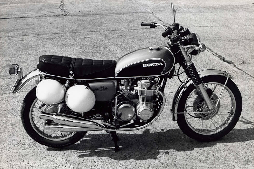 Publicity photo showing the convenience of the helmet holder (Japanese model)