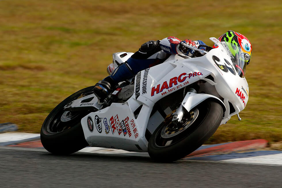 2003 MFJ All Japan Road Race Championship ST600 class Series Champion Yoshiteru Konishi and his CBR600RR