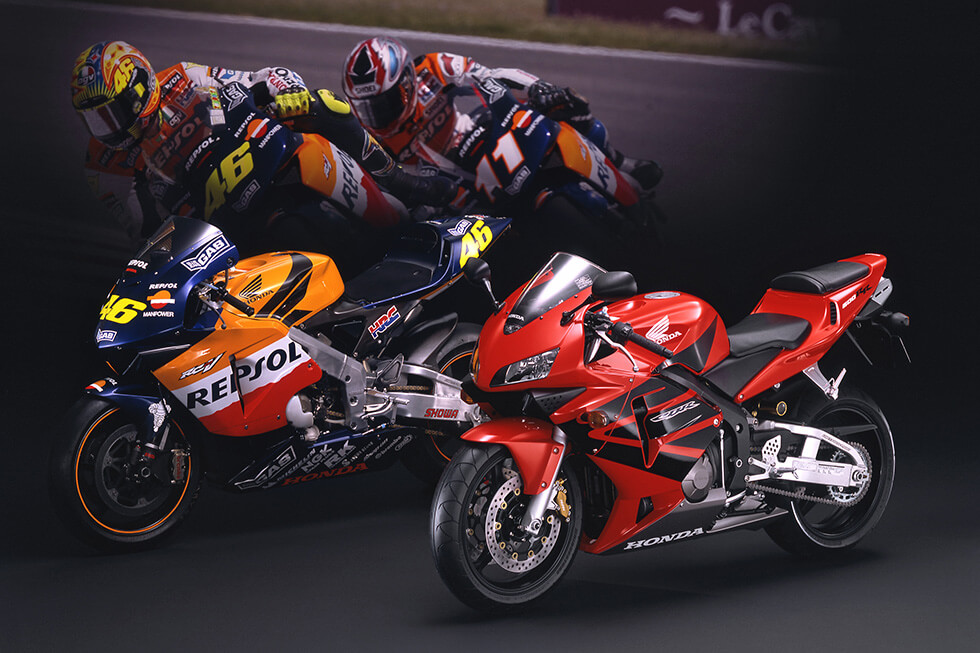 Catalog featured 2002 MotoGP-winning RC211V alongside CBR600RR.