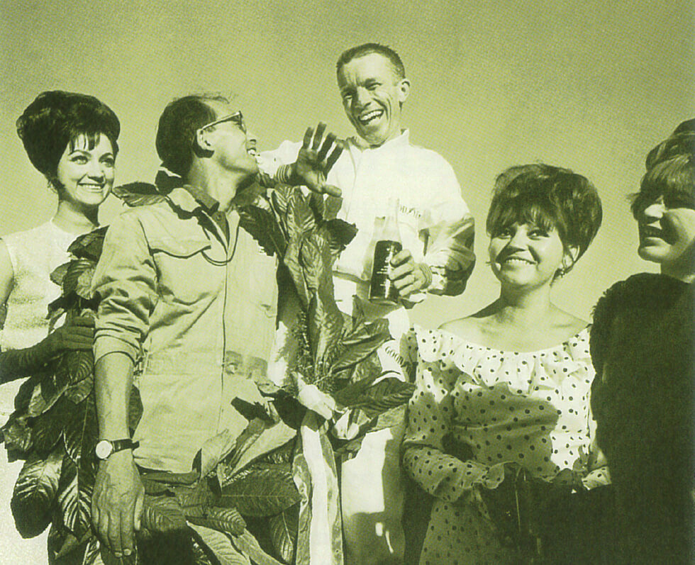 Richie Ginther (cente1) and Nakamura share the joy of their first victory at the Mexican Grand Prix in October, 1965