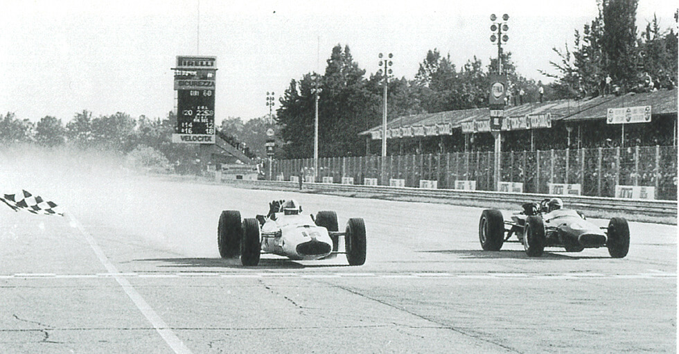 Surtees' machine (left) getting the checkered flag in the Italian Grand Prix in September 1967. The lightweight chassis, developed jointly with Lora, contributed to the team's second victory. 