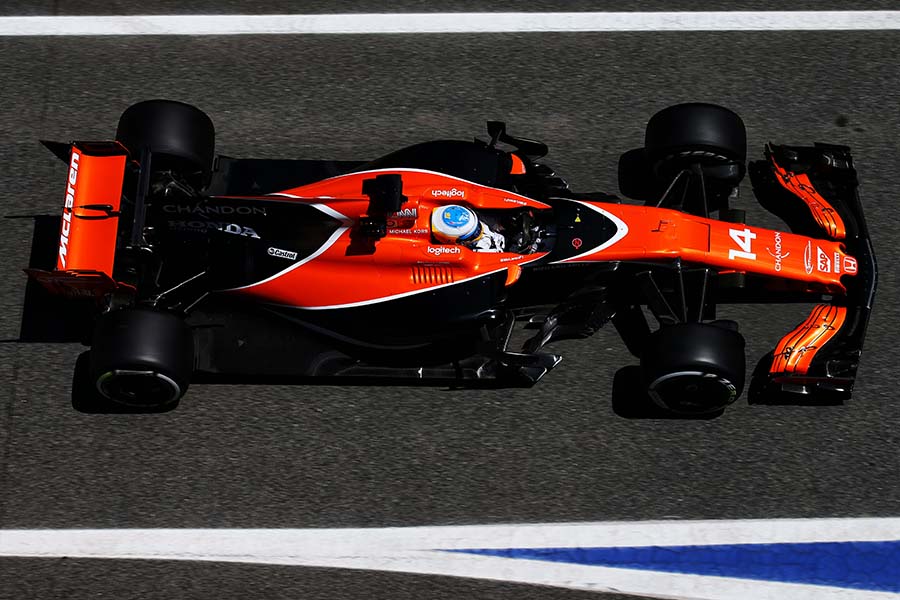 New chassis regulations increased tread and tire sizes. The rear wing was mounted low, the shark fin on the engine cover made a return, and aero devices at the floor front, from the rear of the front tire to the side pontoons, became more complex. Livery was returned to its roots, with orange as its base color.