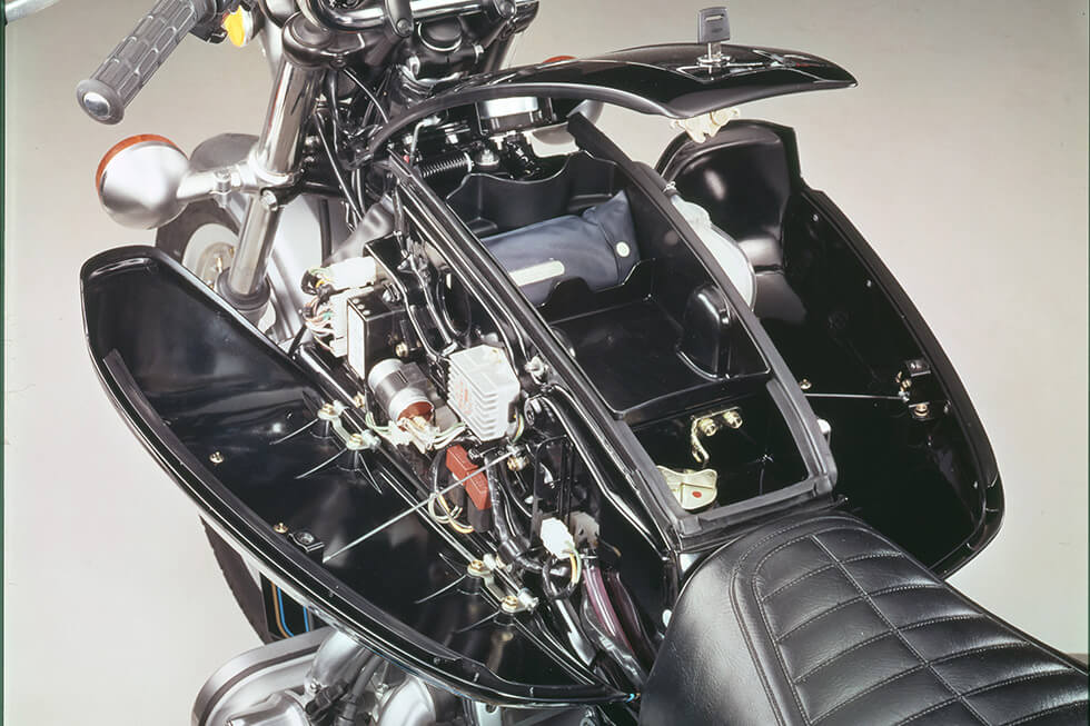 Electric components and wiring is stored in the dummy fuel tank.