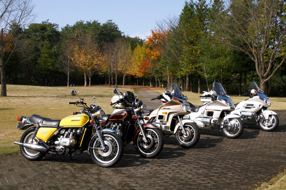 Successive generations lined up shows how the Gold Wing evolved into a long-distance tourer (GL1000 on the left)