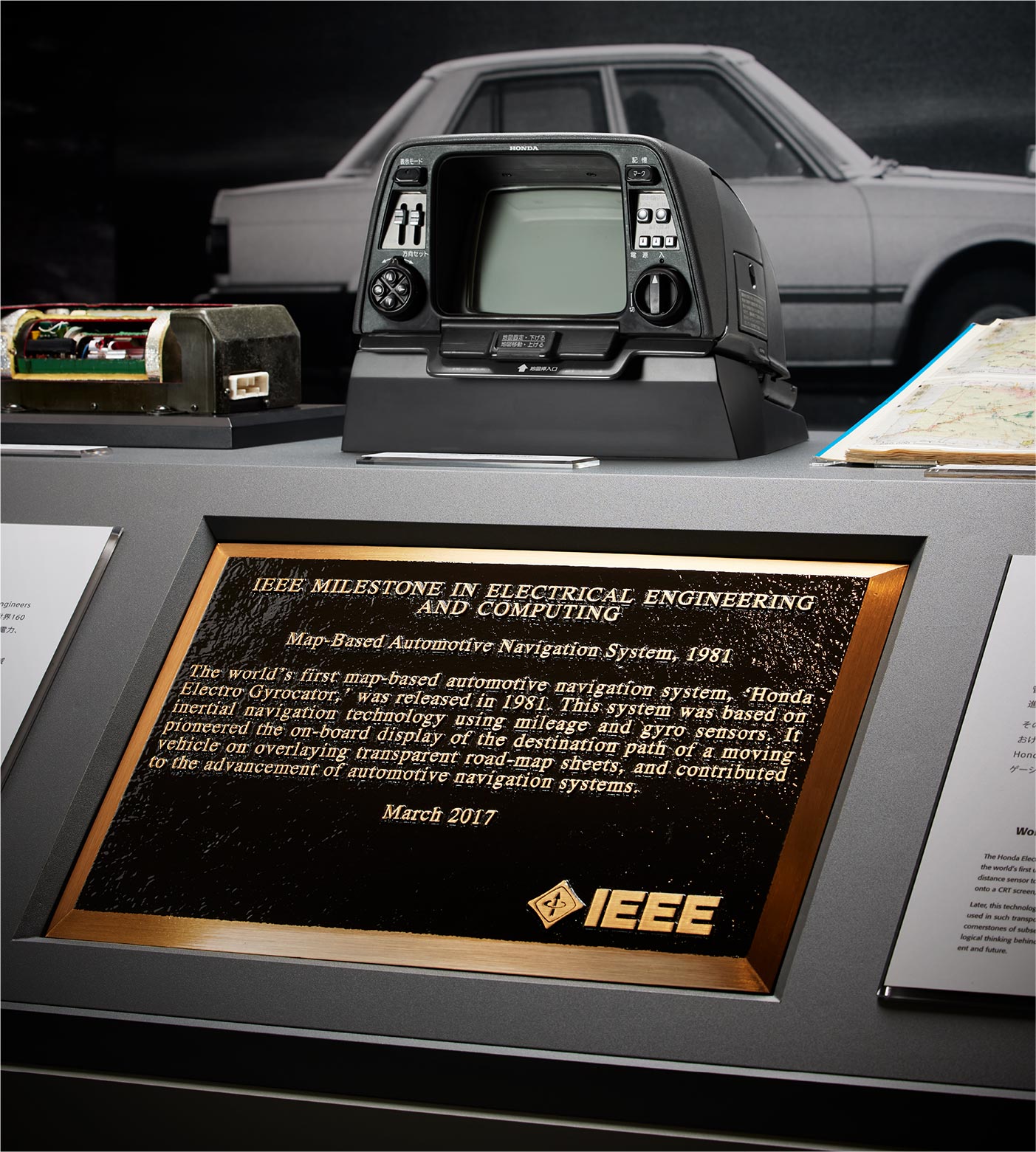 Honda Electro Gyrocator and IEEE award plaque (photo taken in 2023 at the Honda Collection Hall)