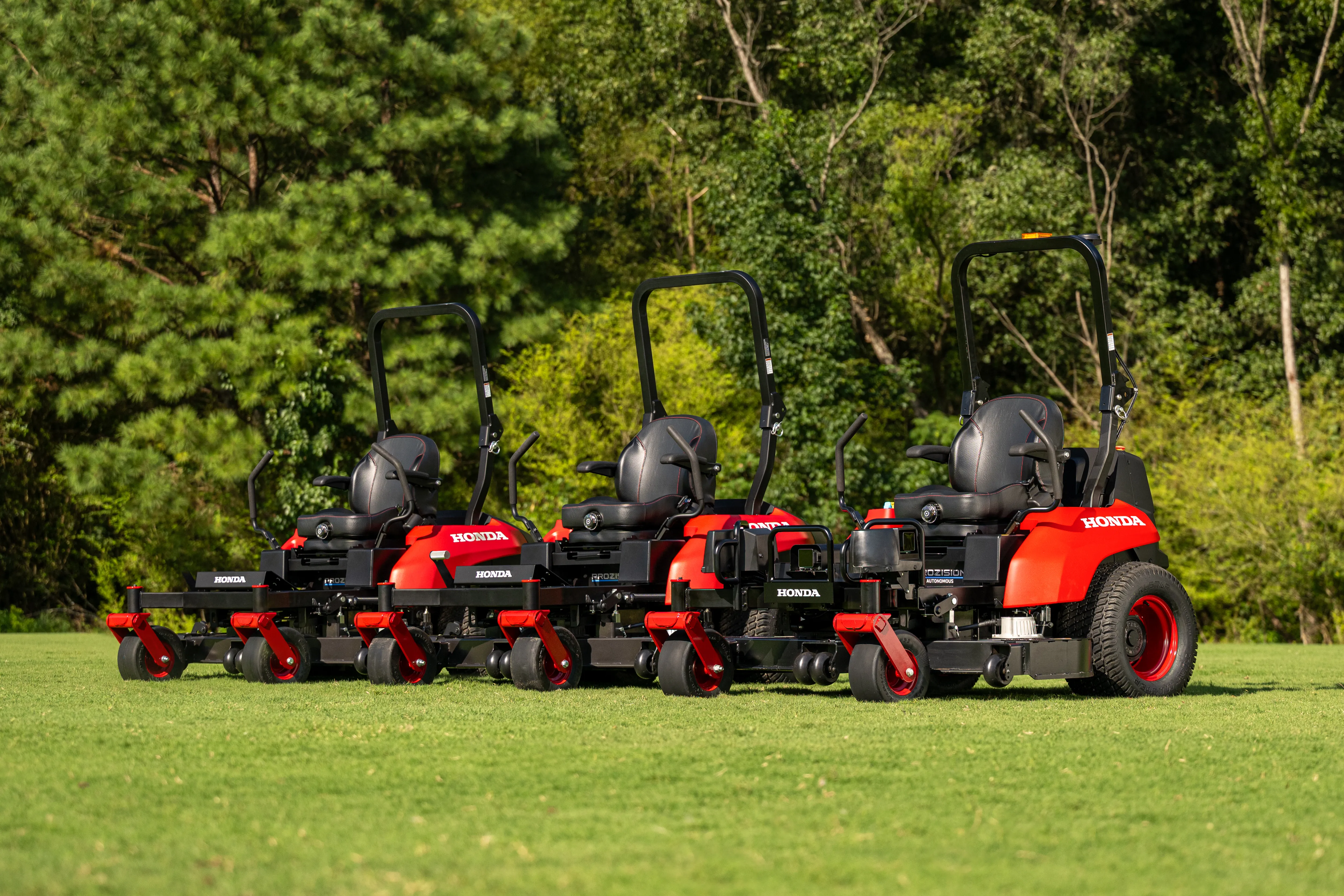 ProZision manual electric lawn mower (left/center), ProZision Autonomous (right)