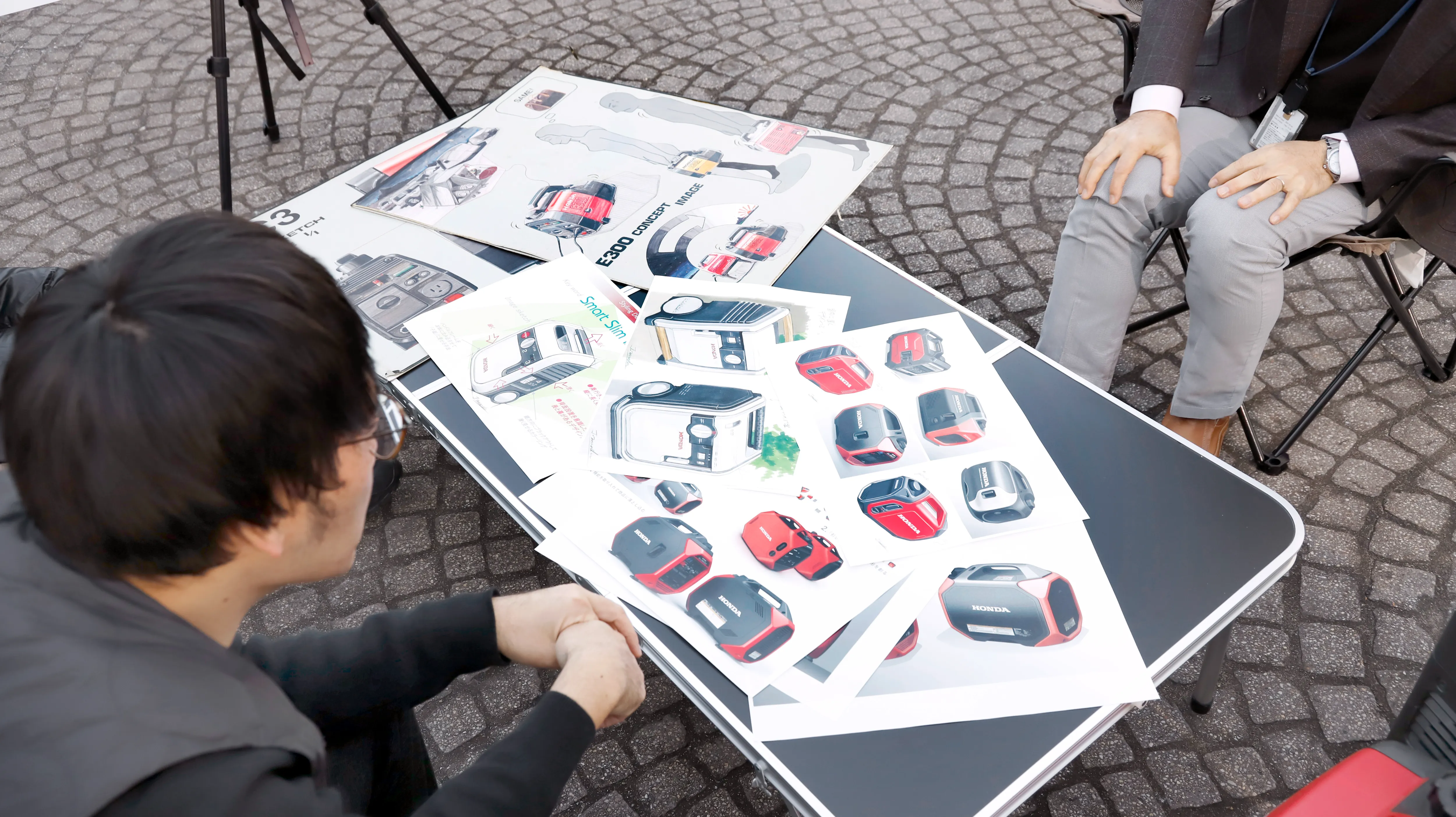 Nakaura discussing design