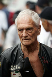 Luigi Taveri (right) and Jim Redman (left), the riders who took Honda to glory in its early days of world class motorcycle racing.. They still look fearless, and their expressions, those of true champions who achieved glory at the pinnacle of racing.