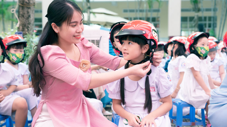 Donating Helmets to Children in Vietnam