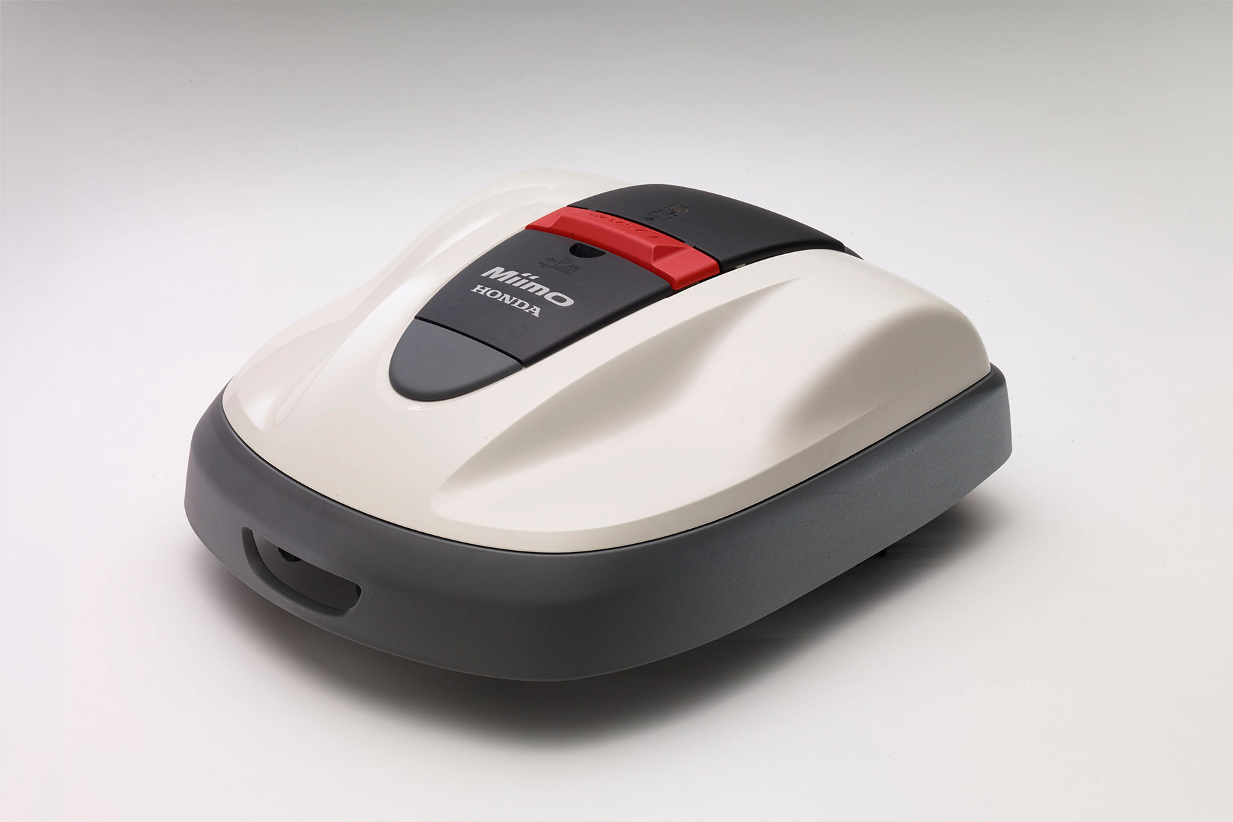 Miimo, a robotic lawnmower that travels under electric power while automatically cutting the grass