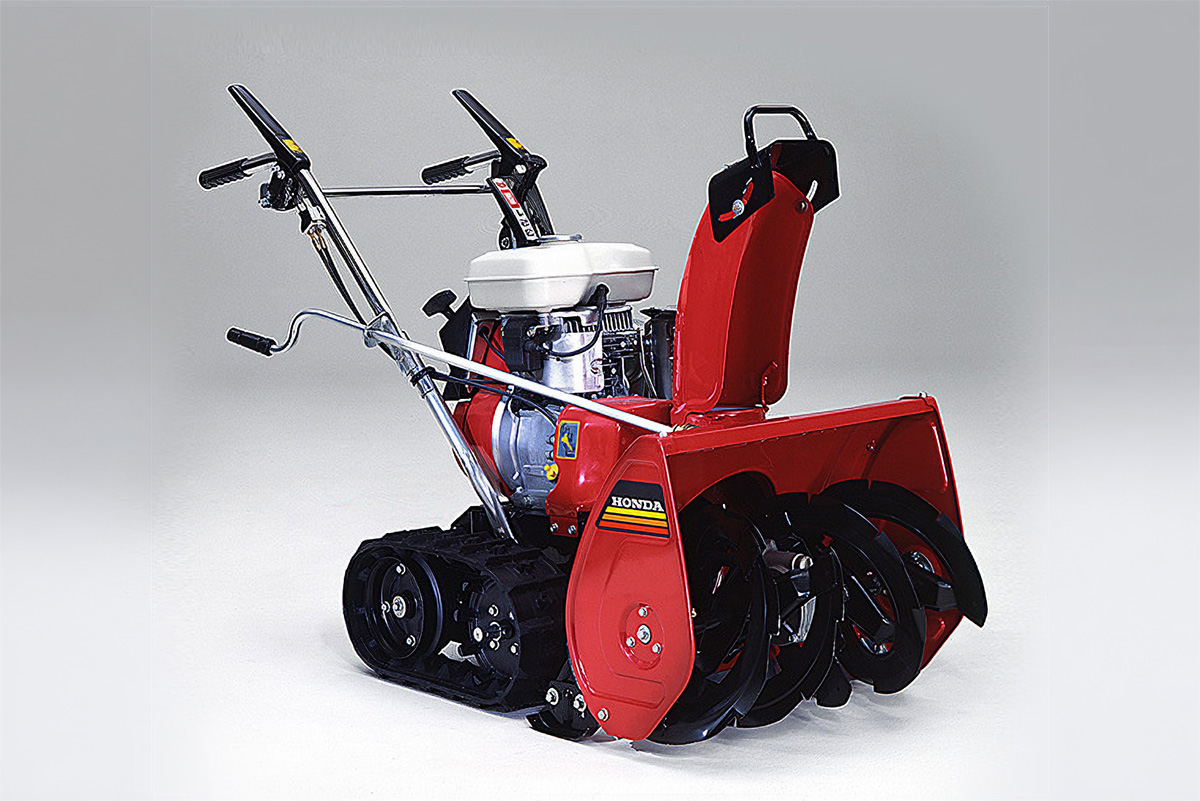 The HS50 featured a two-stage system with separate snow collection and discharge mechanisms.