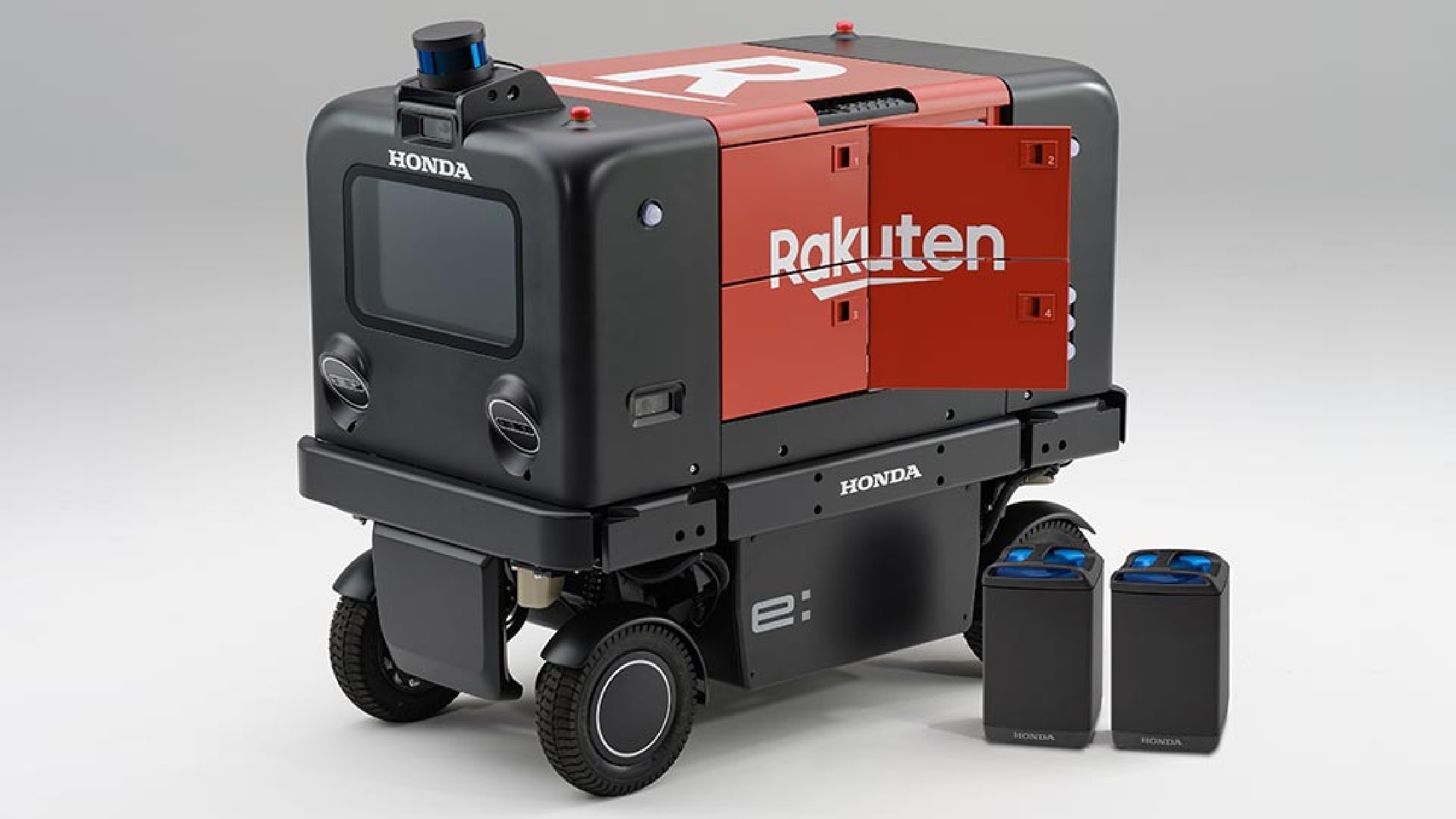 The trial used an autonomous delivery robot powered by two Honda Mobile Power Packs mounted between the front and rear wheels.