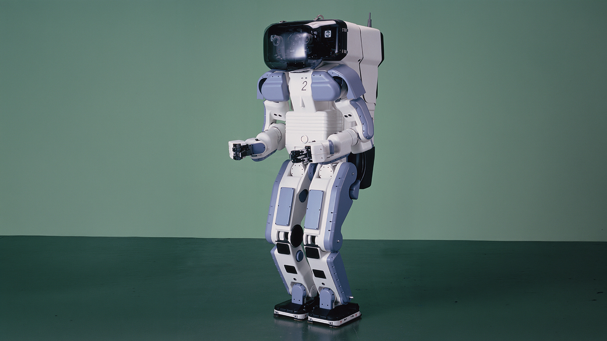 Honda’s P2 Humanoid Robot: Control Technologies Behind Technical Benchmark for Autonomous Bipedal Walking